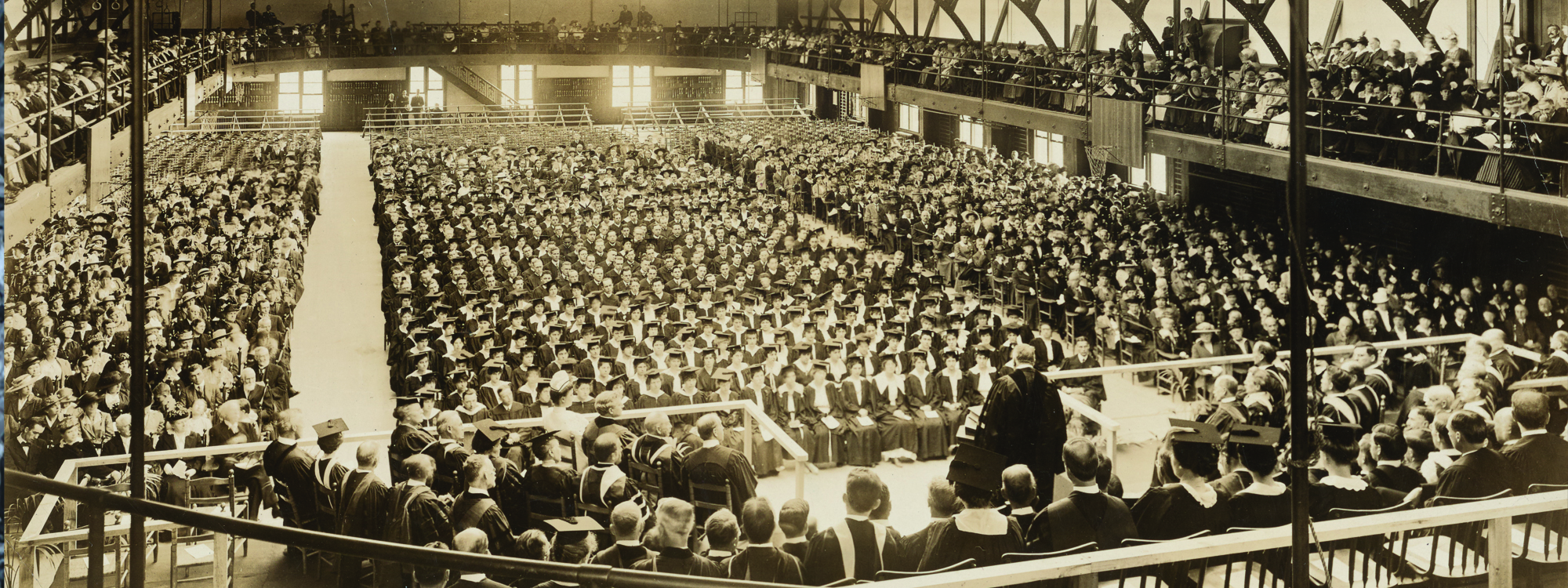 Photograph of Chancellor James Roscoe Day speaking at Commencement in Archbold Gymnasium, 1916